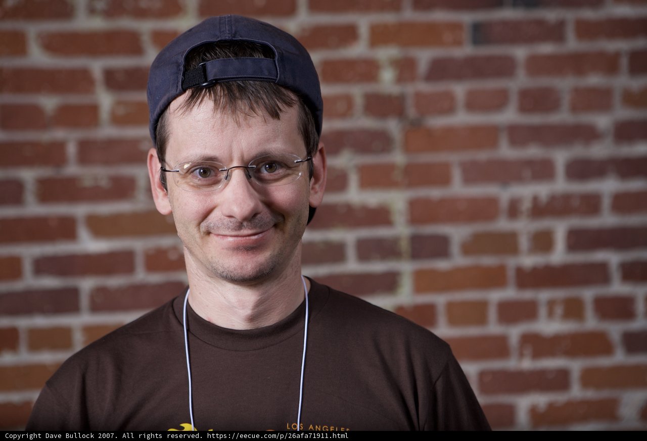 Happy Man in Glasses and Hat
