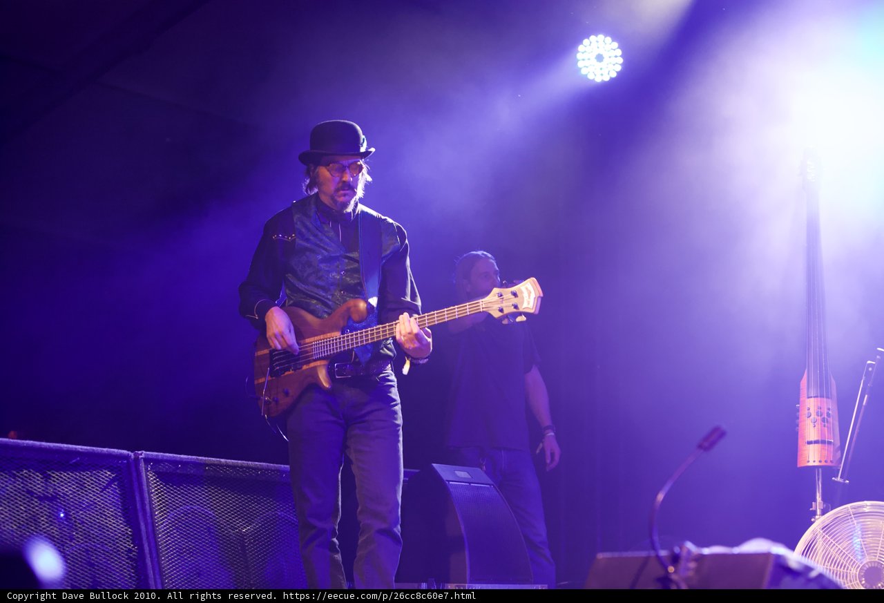 Les Claypool Shreds on Stage with His Guitar