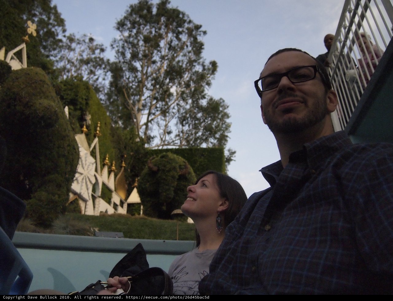 Couple Enjoying Disneyland Ride at Dusk