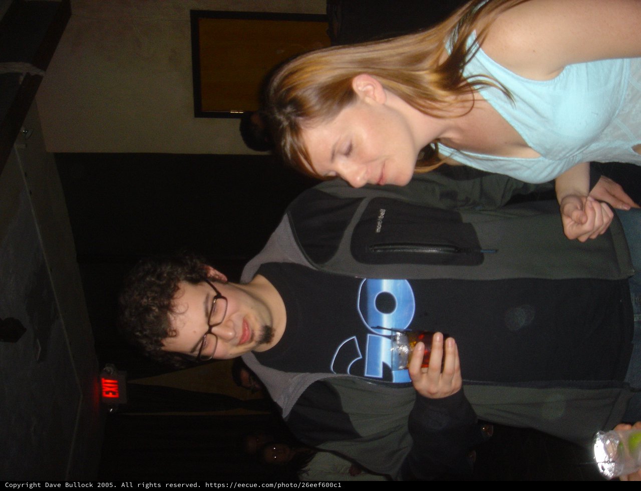Two Friends at a Dimly Lit Venue 2005