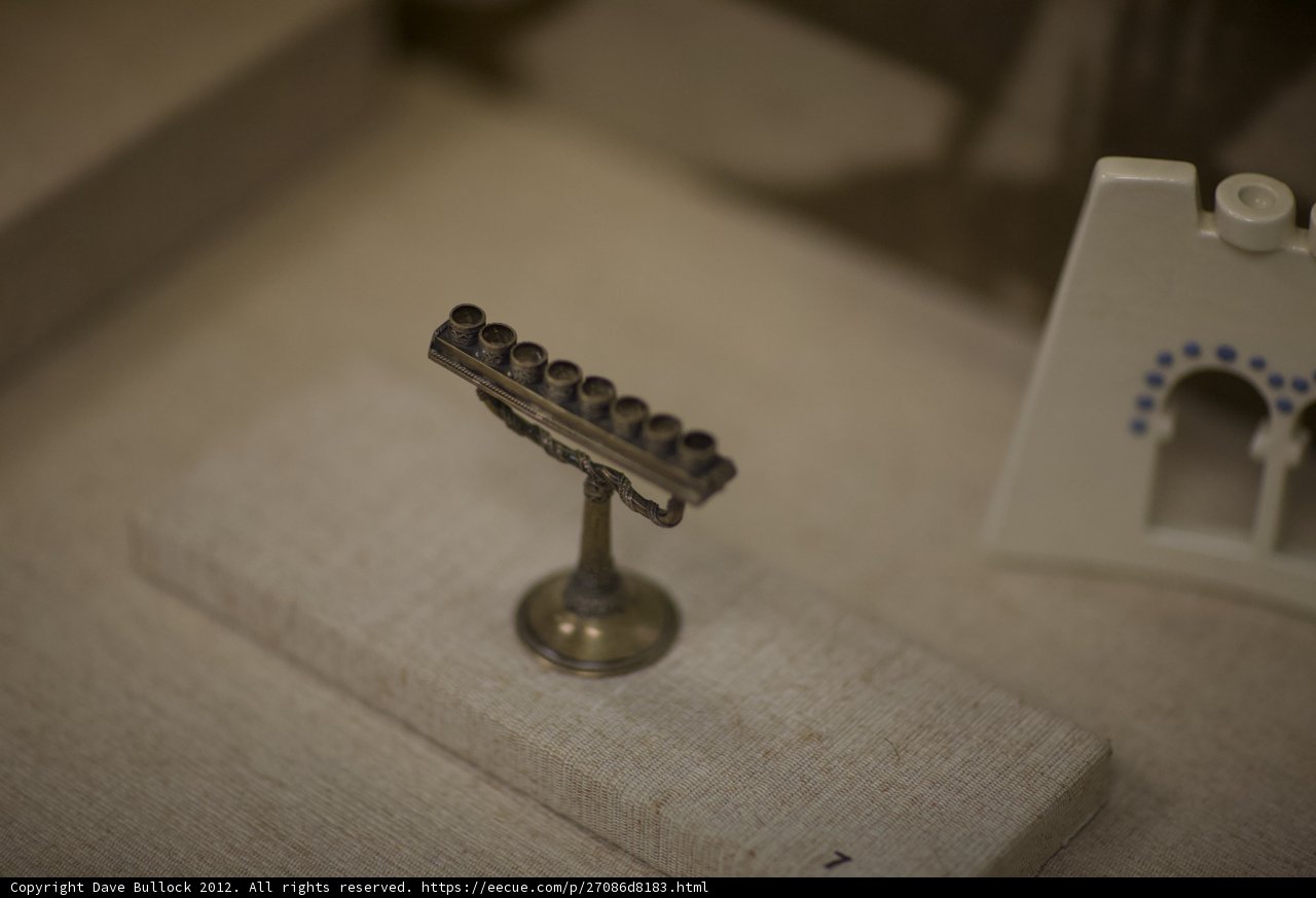 A Silver Menorah Glows in the Museum