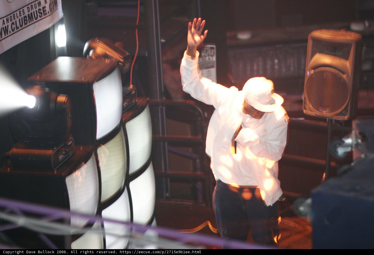 Man in White Sun Hat on Stage