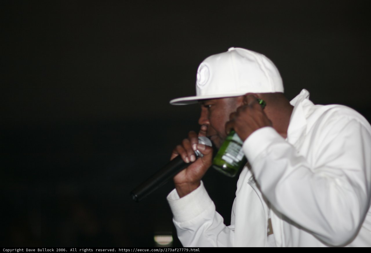 Man in White Hat Enjoying a Beer