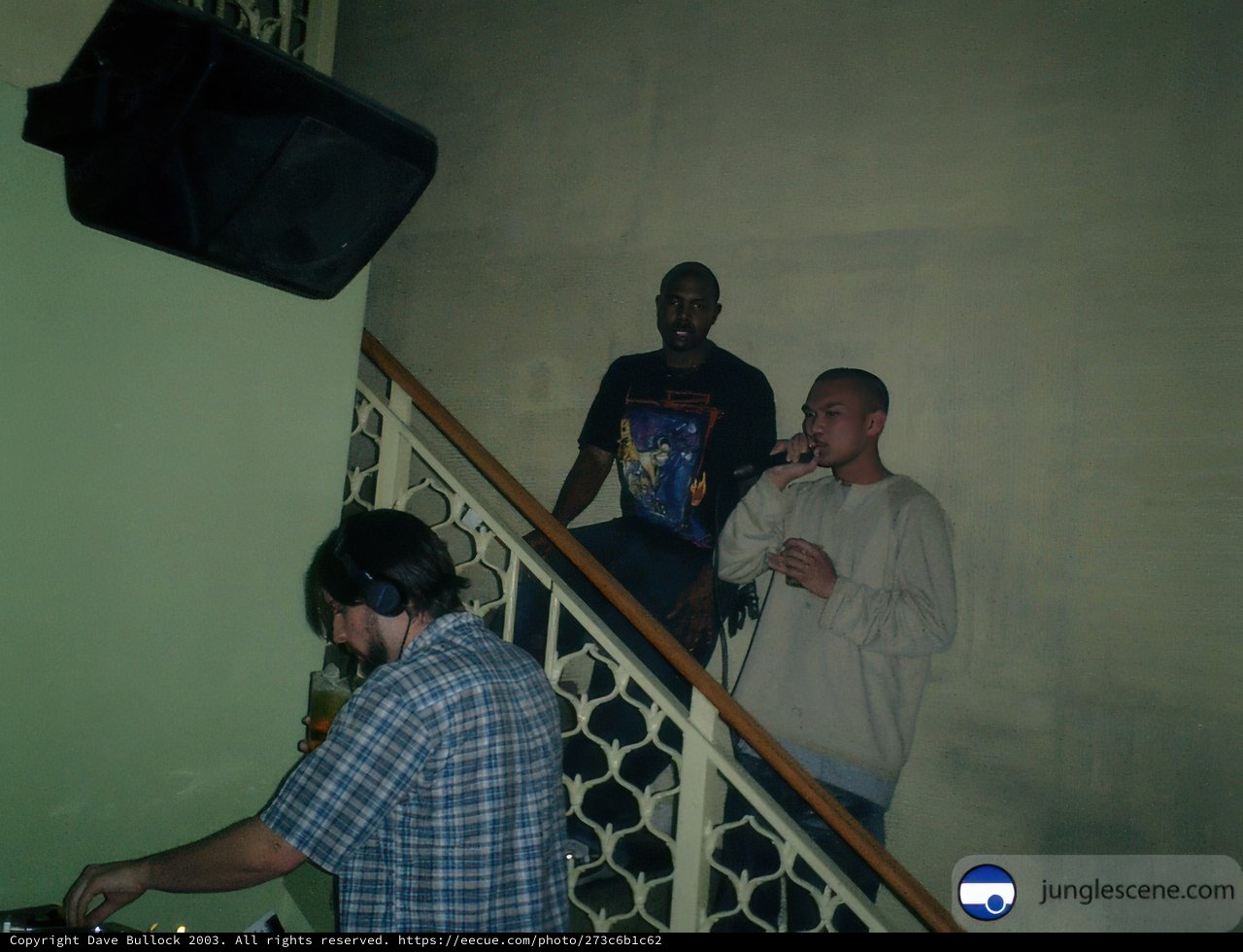 Three Men and a DJ on the Stairs