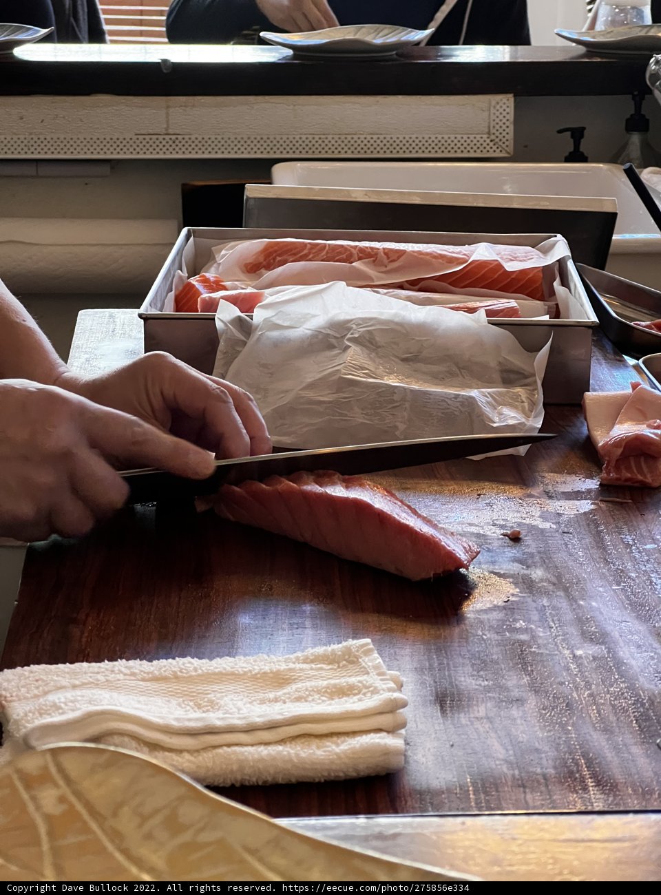 A Person Expertly Prepares Meat in San Francisco