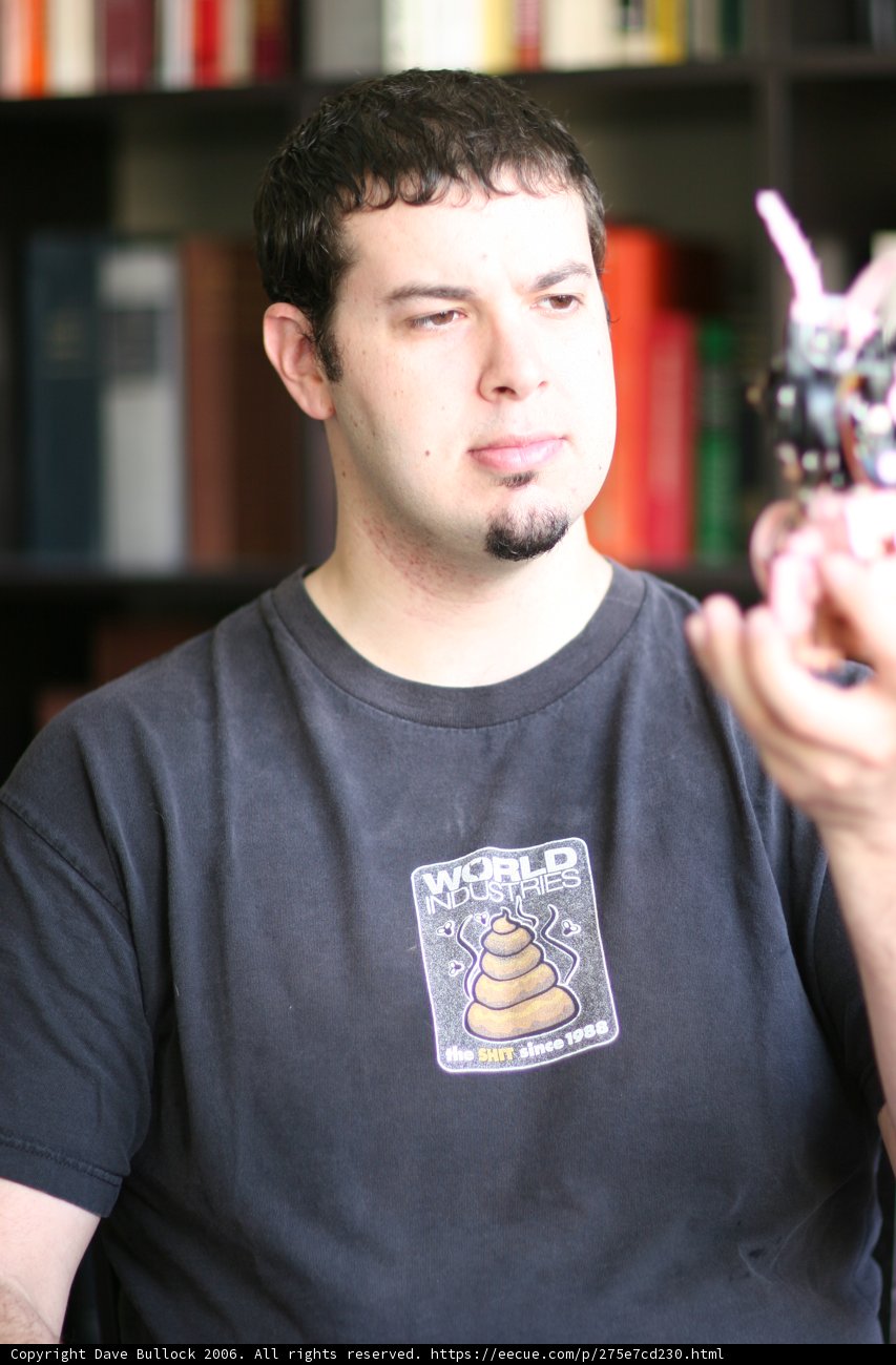 Dave B and his Toy on the Bookshelf