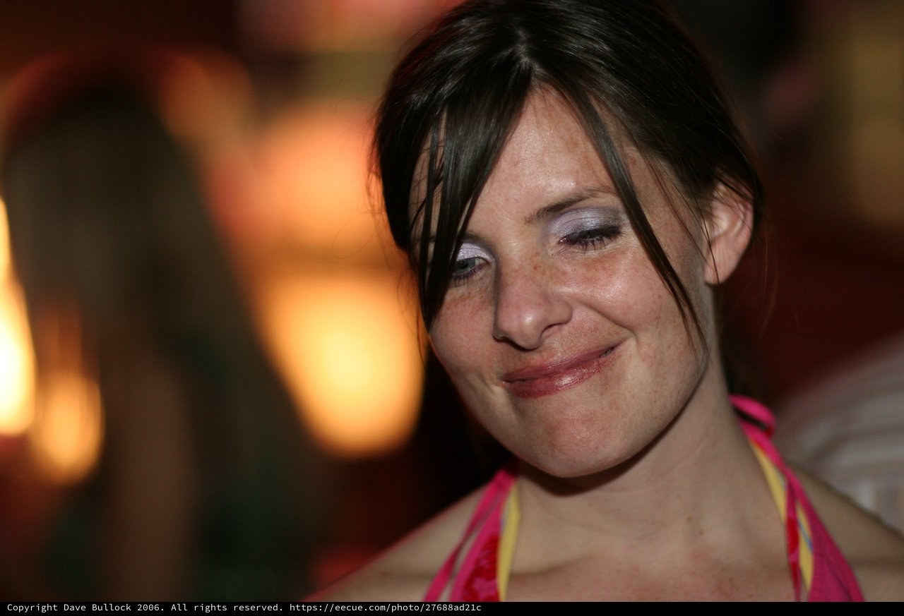 Candid Smile of a Woman at Evening Gathering