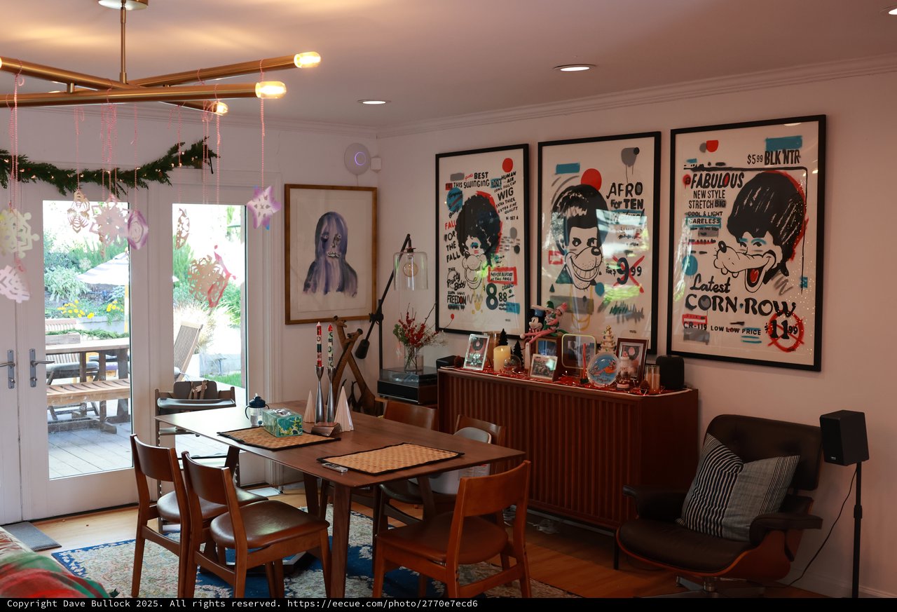 Mid-Century Modern Dining Room with Pop Art Posters