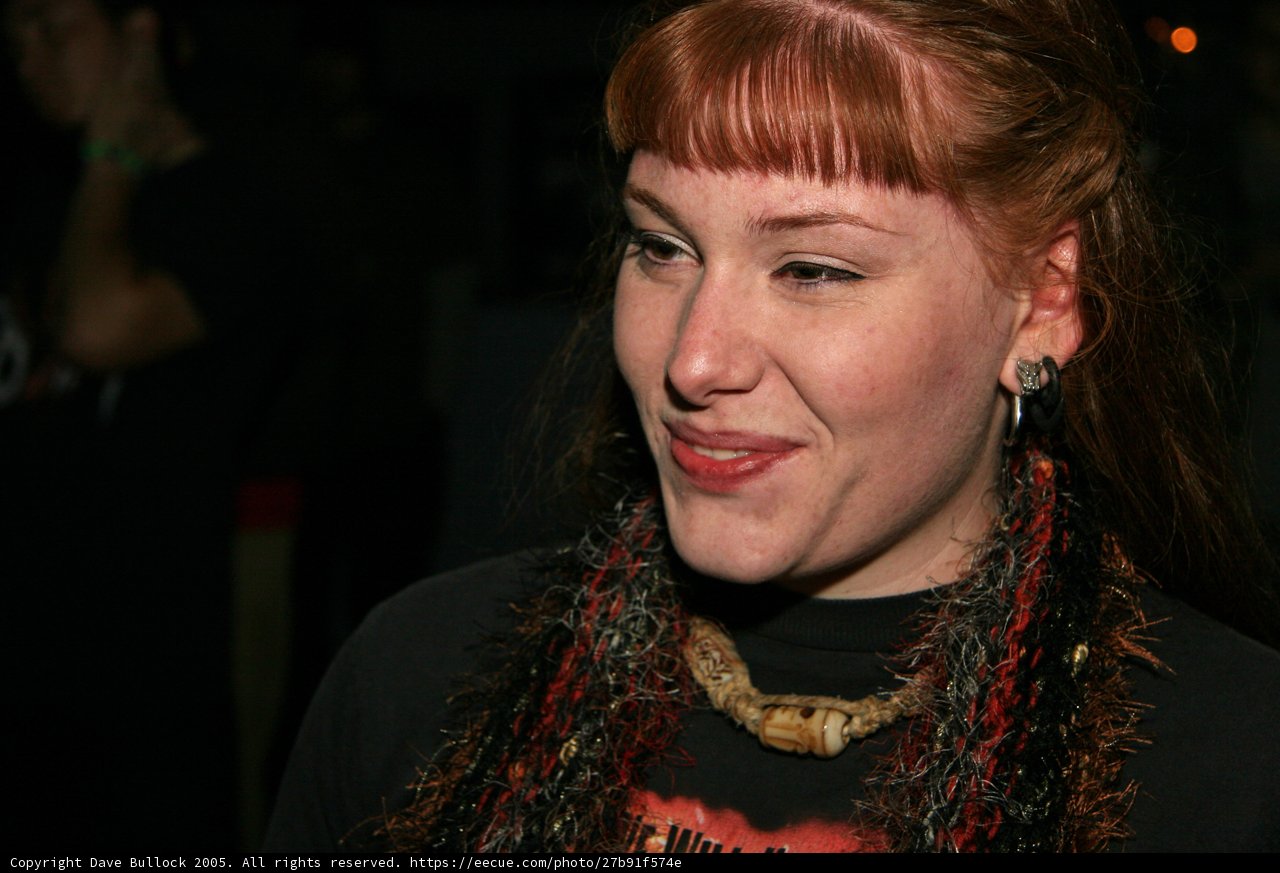 Red-Haired Woman with Scarf and Earrings