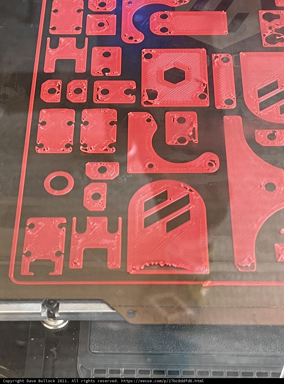 Assorted Parts on a Red Sheet