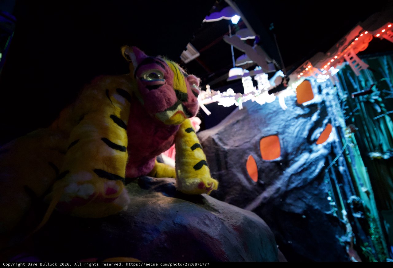 Whimsical Puppet Characters in Illuminated Night Scene