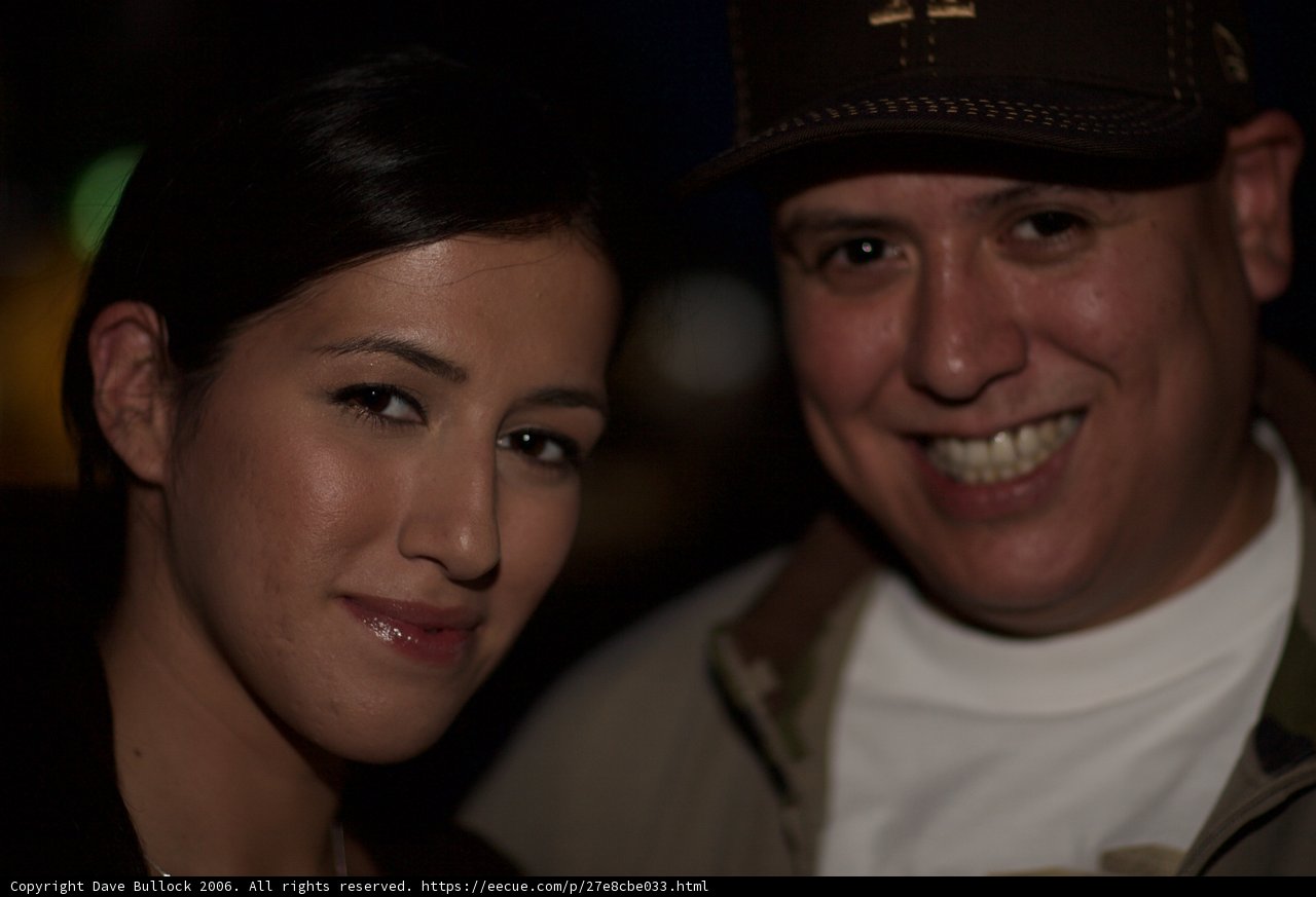 Smiling Couple in Baseball Caps
