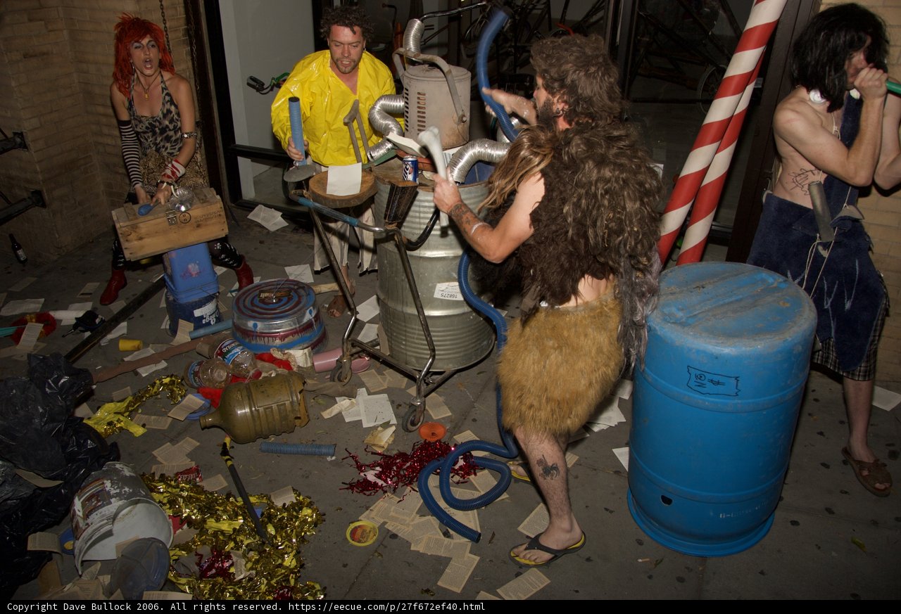 Costumed Man with Mysterious Object