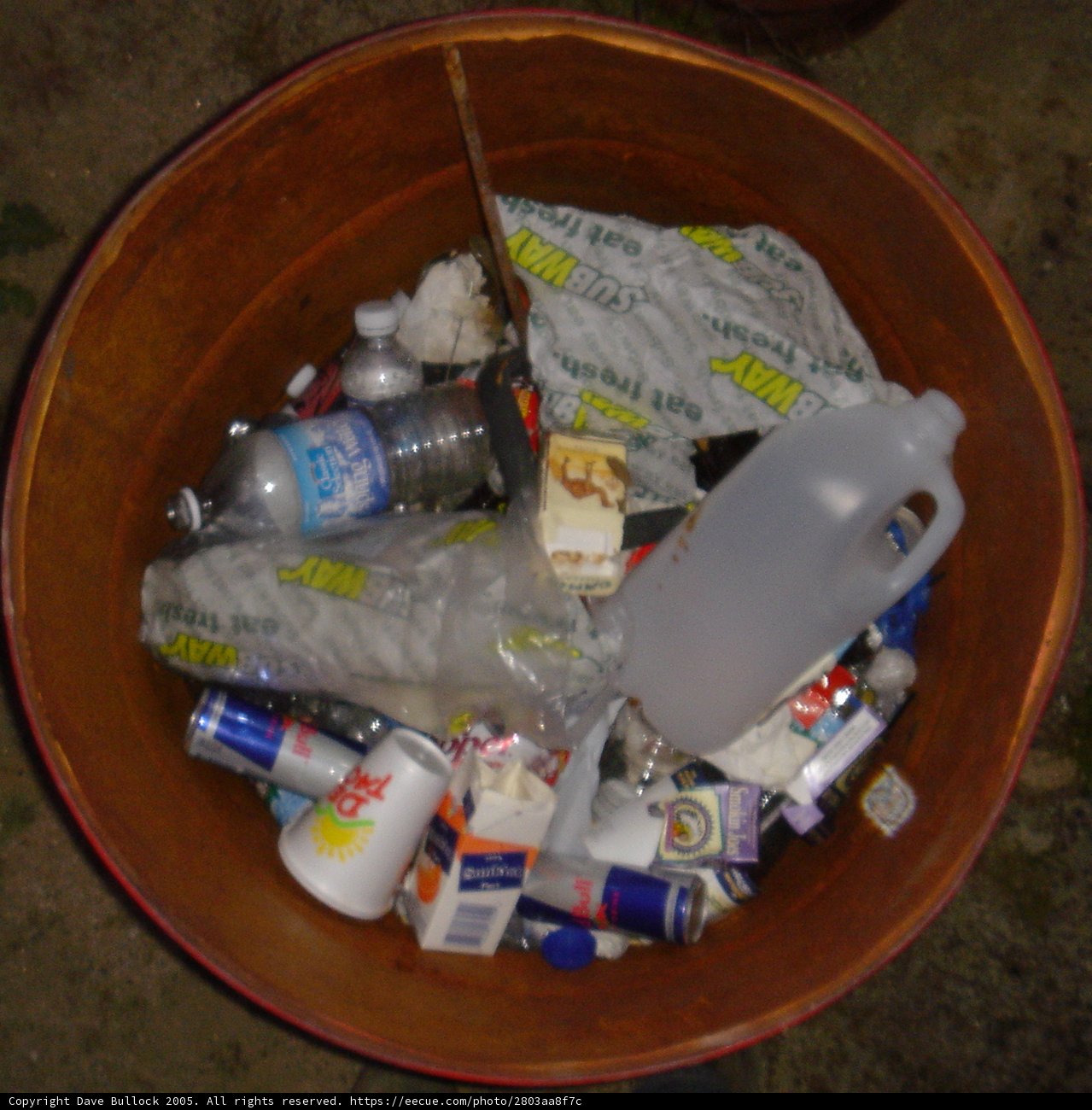 Brown Wooden Bowl Among Trash