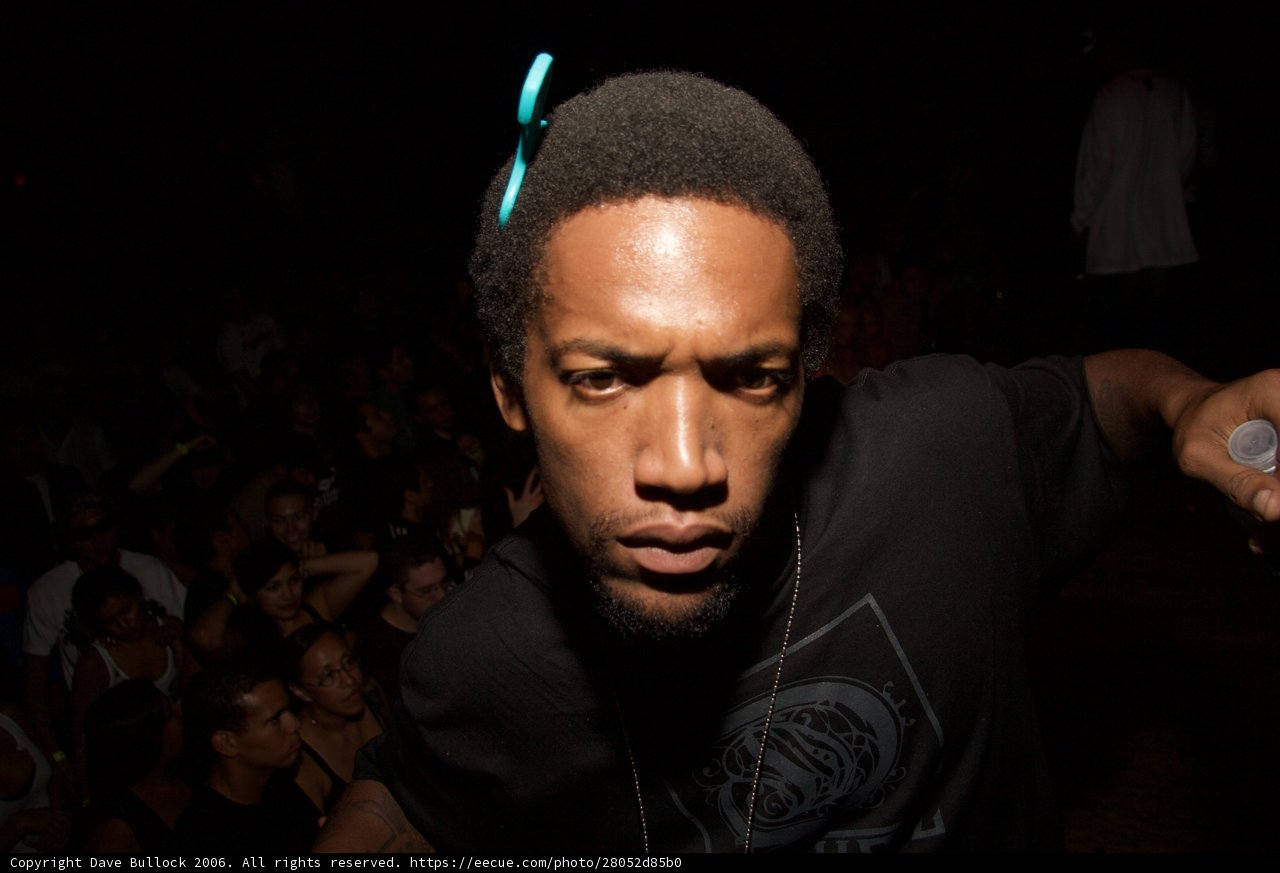 Blue Haired Man in a Crowded Night Club