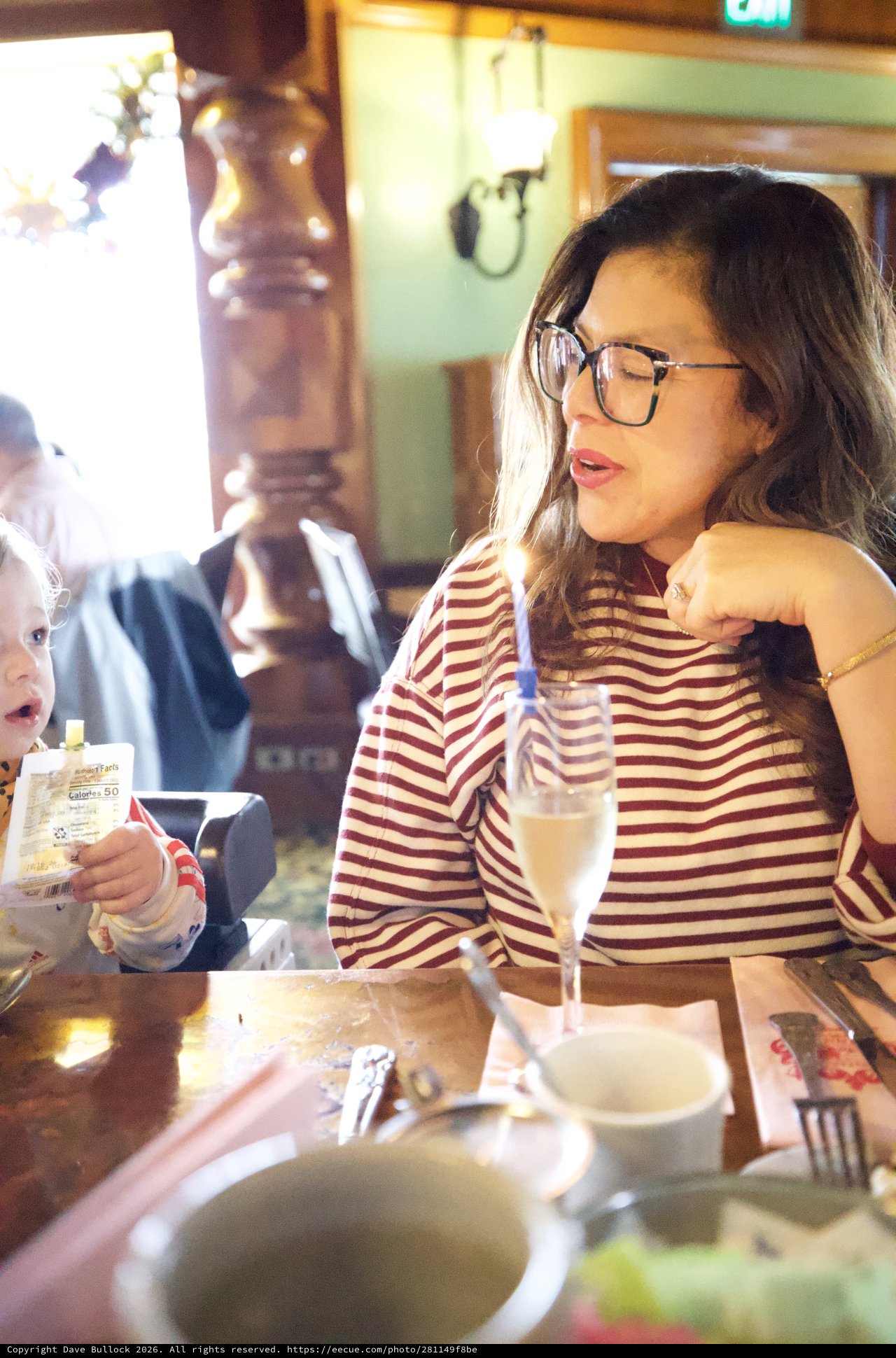 Mother and Child Dining Together at Restaurant