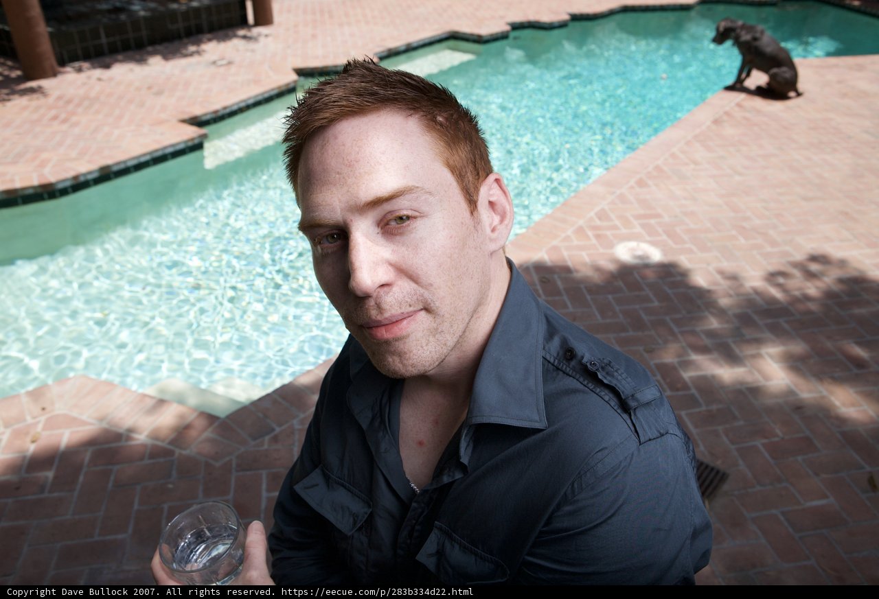 Man Relaxing by the Pool
