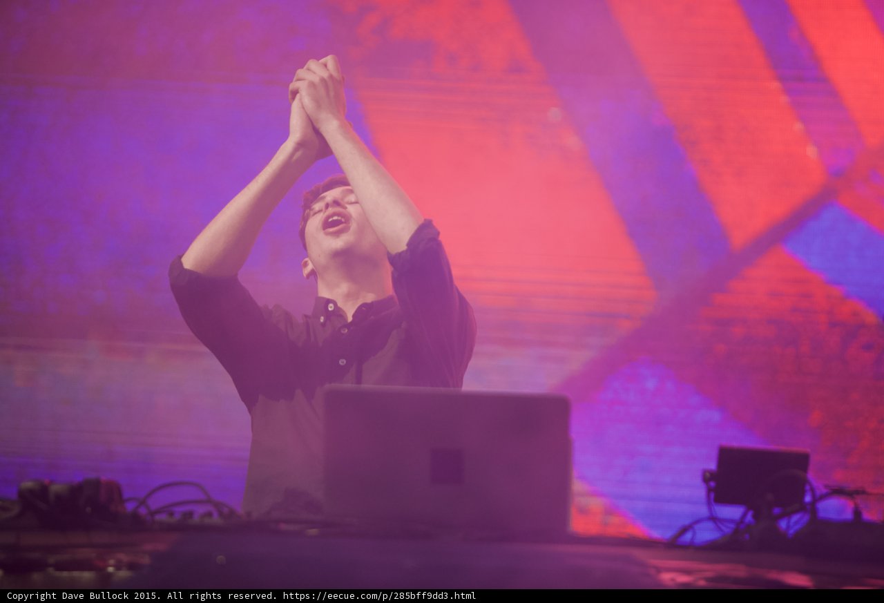 Flume Hands Clasped Above Head