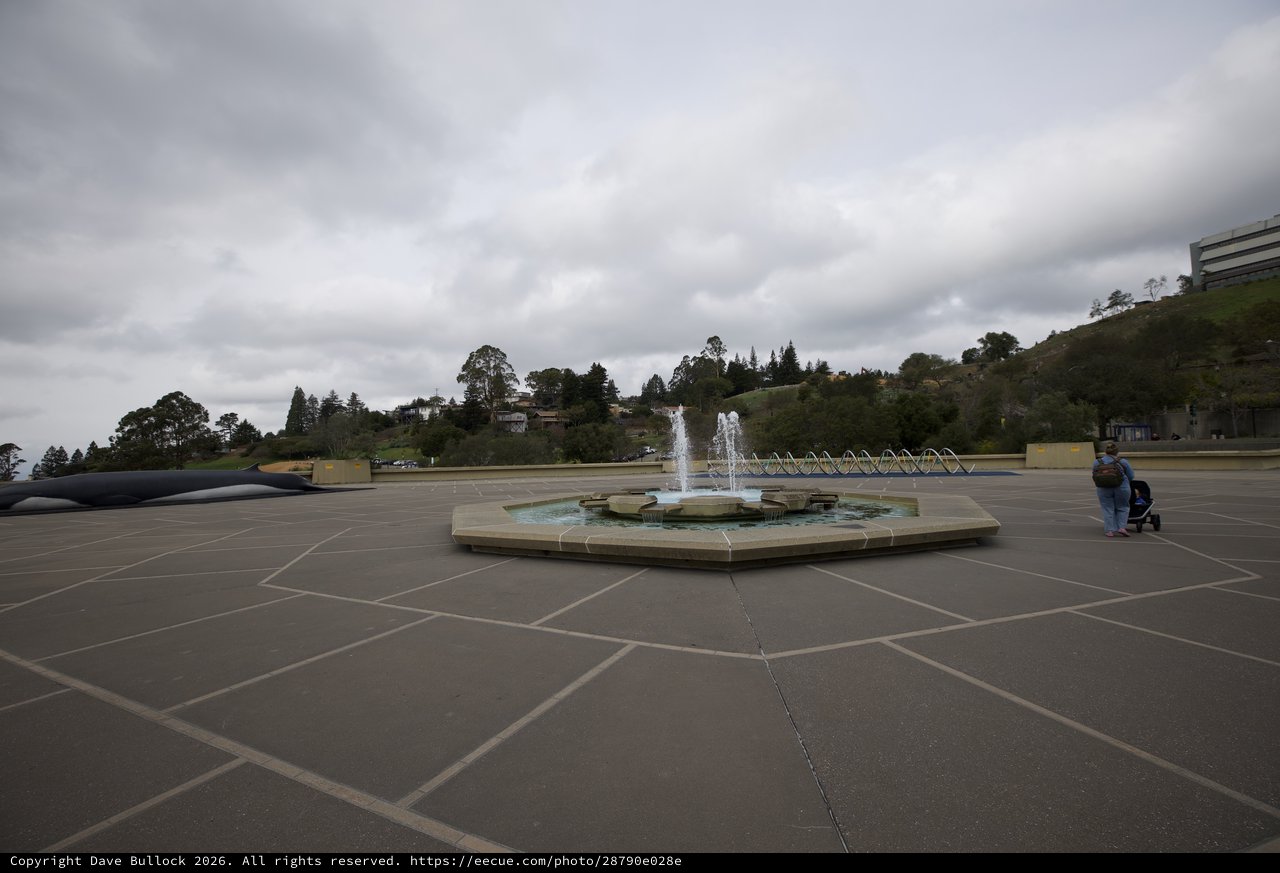 Fountain Plaza on Overcast Day with Distant Hills