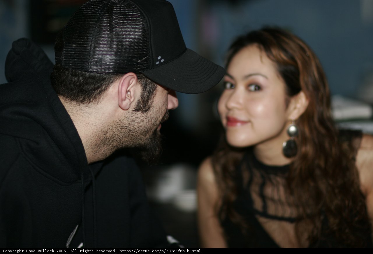 Couple in Baseball Caps
