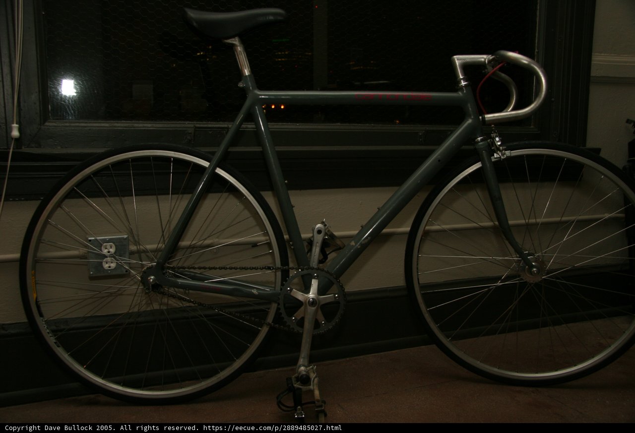 Parked Bicycle by the Window