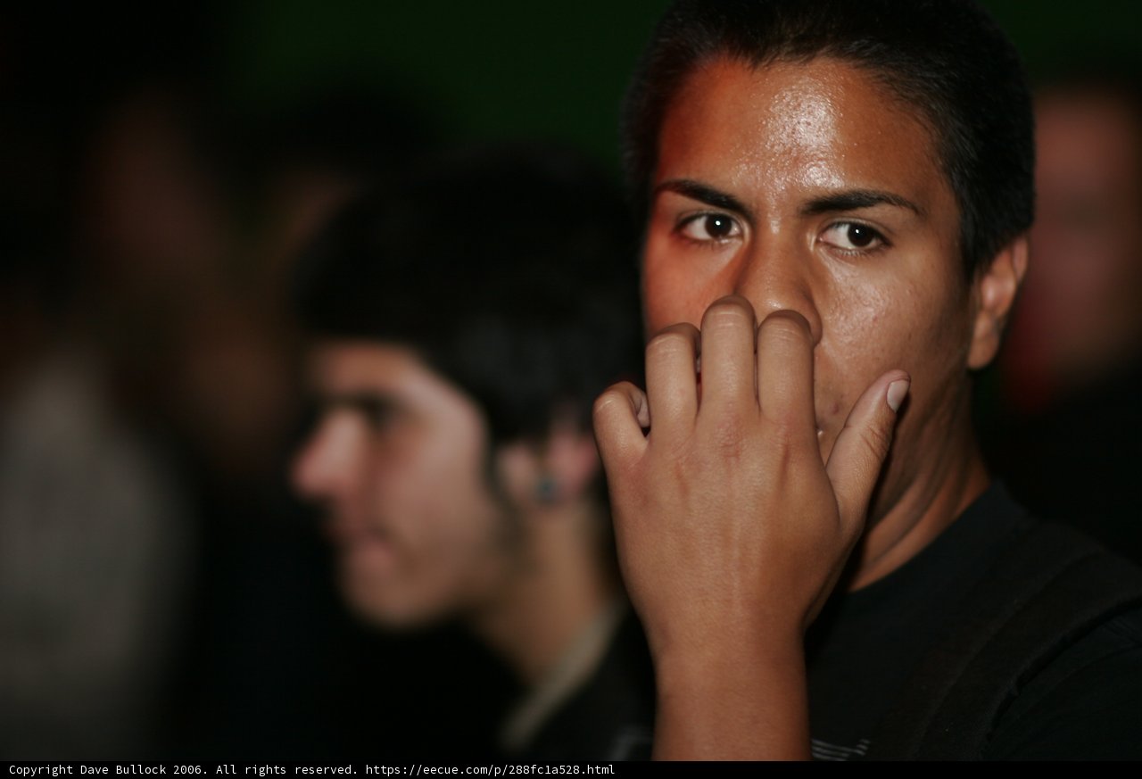 Contemplative Man with Hand to Face