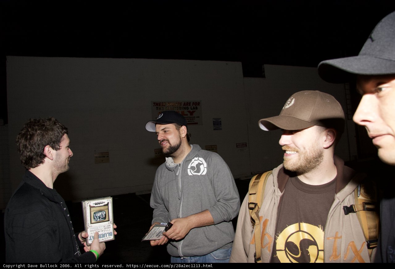 Three Men Chatting