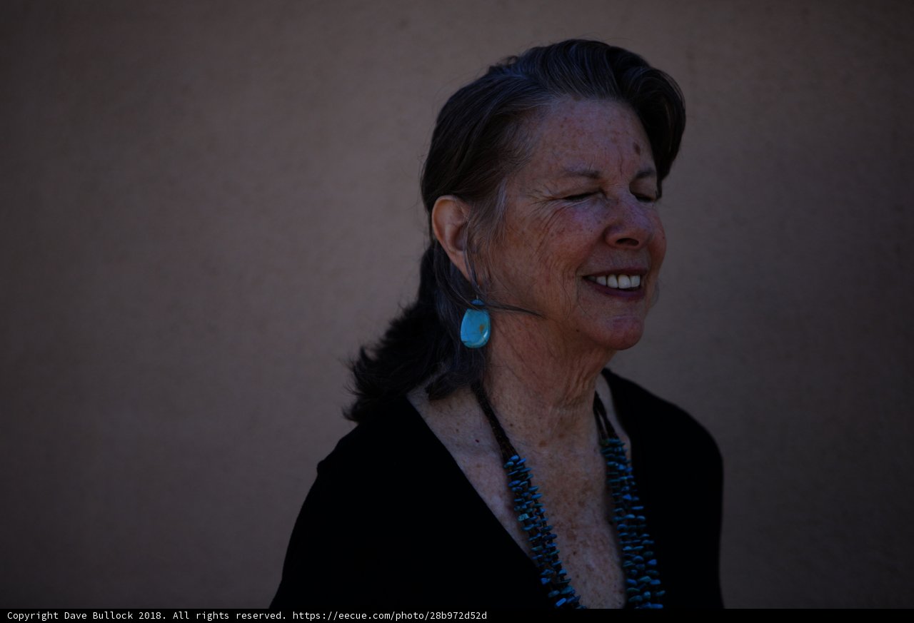 Blue Earrings and a Radiant Smile