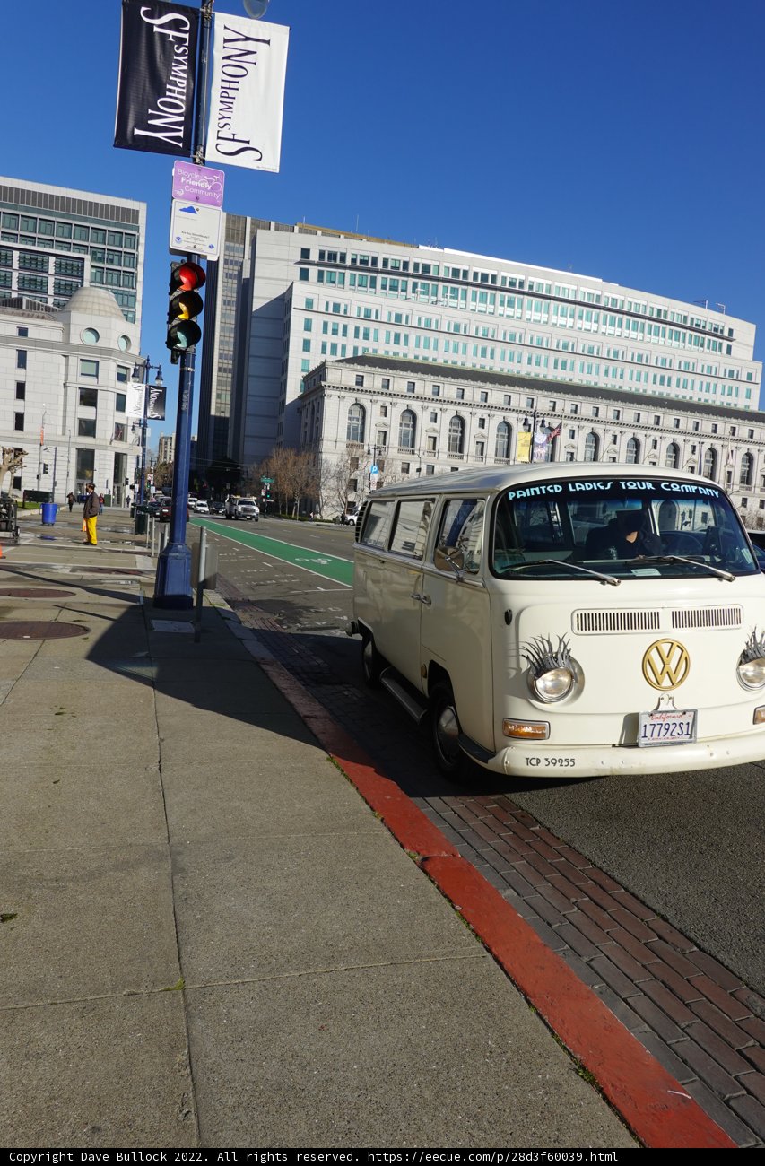 Parked Van on Urban Sidewalk