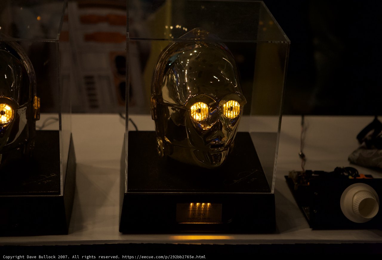 Glowing Golden Helmets on Display