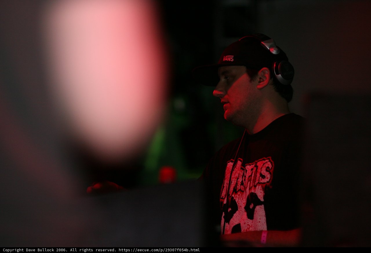 Casual Man in Baseball Cap and Black Shirt