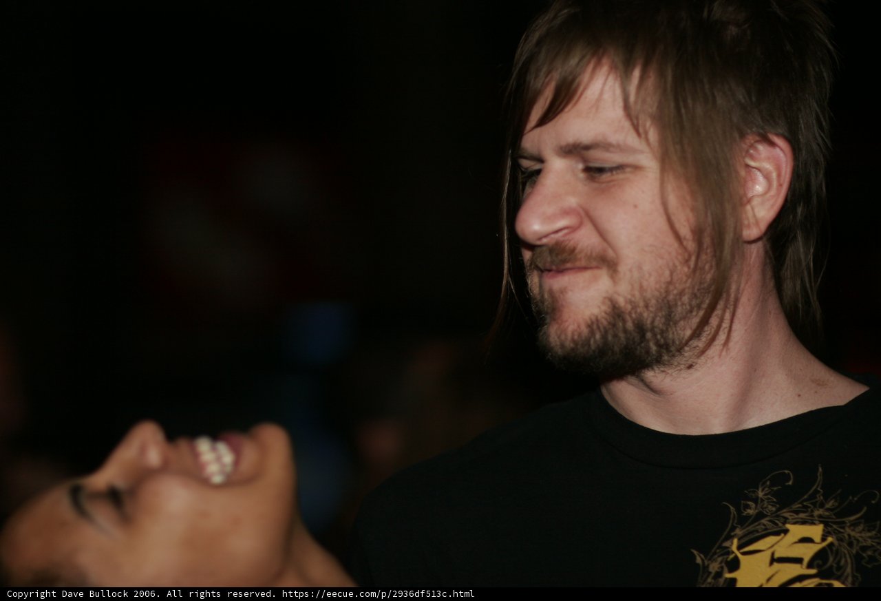 Smiling Couple in Black and Beards