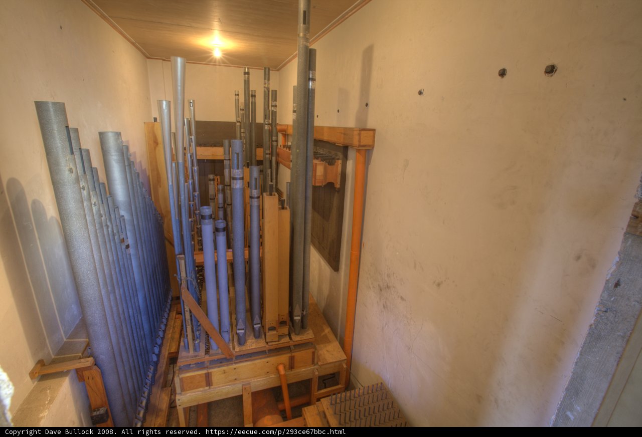Pipes and Ladder in a Wooden Room