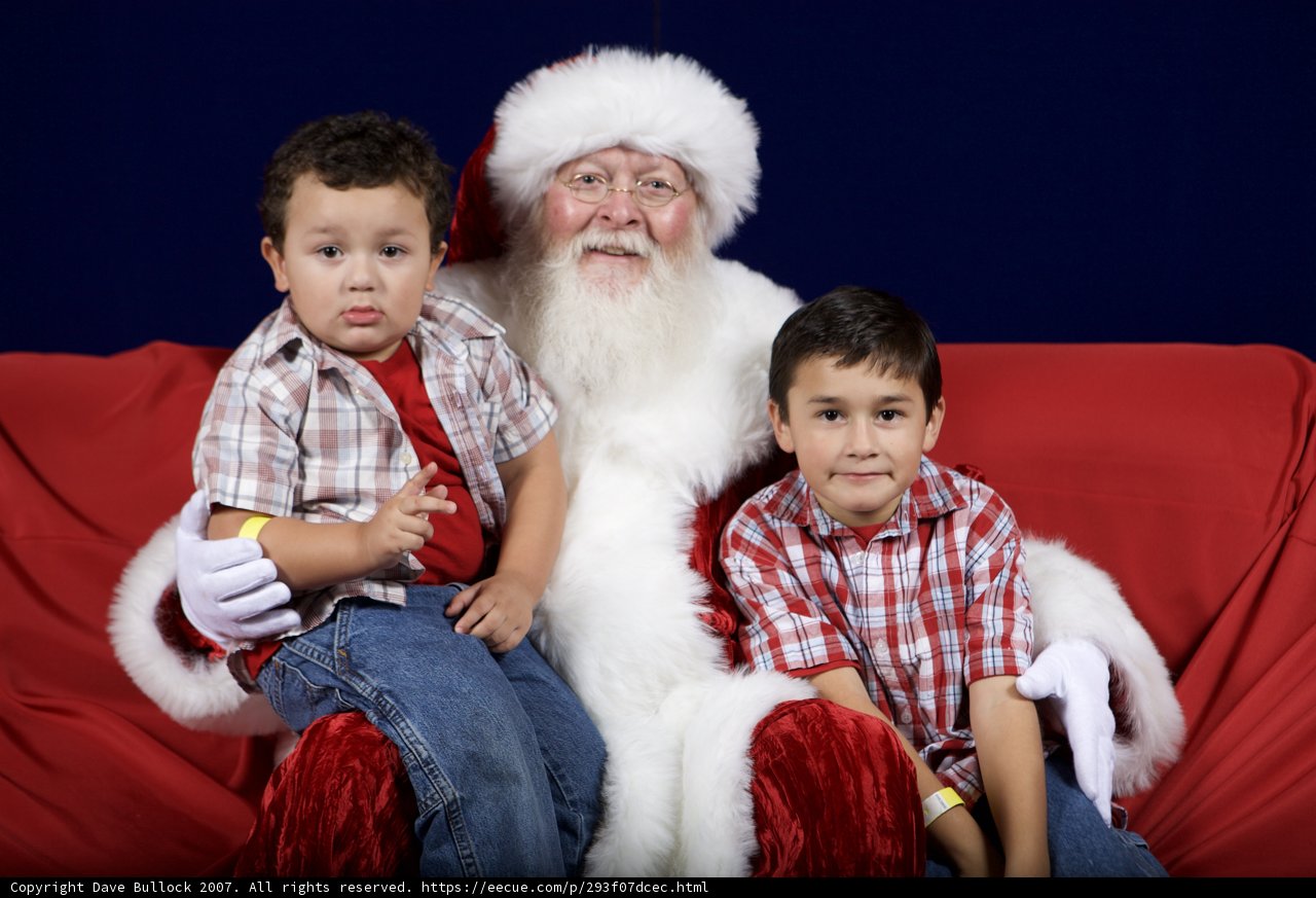 Santa Claus with Two Boys on the Couch