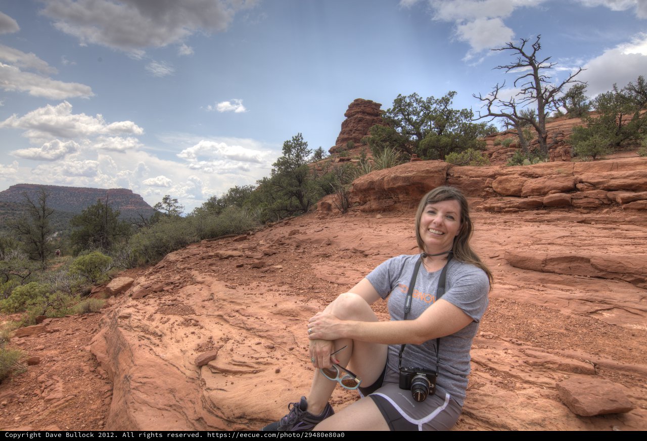 Hiker Resting on Red Rock Formations in Sedona