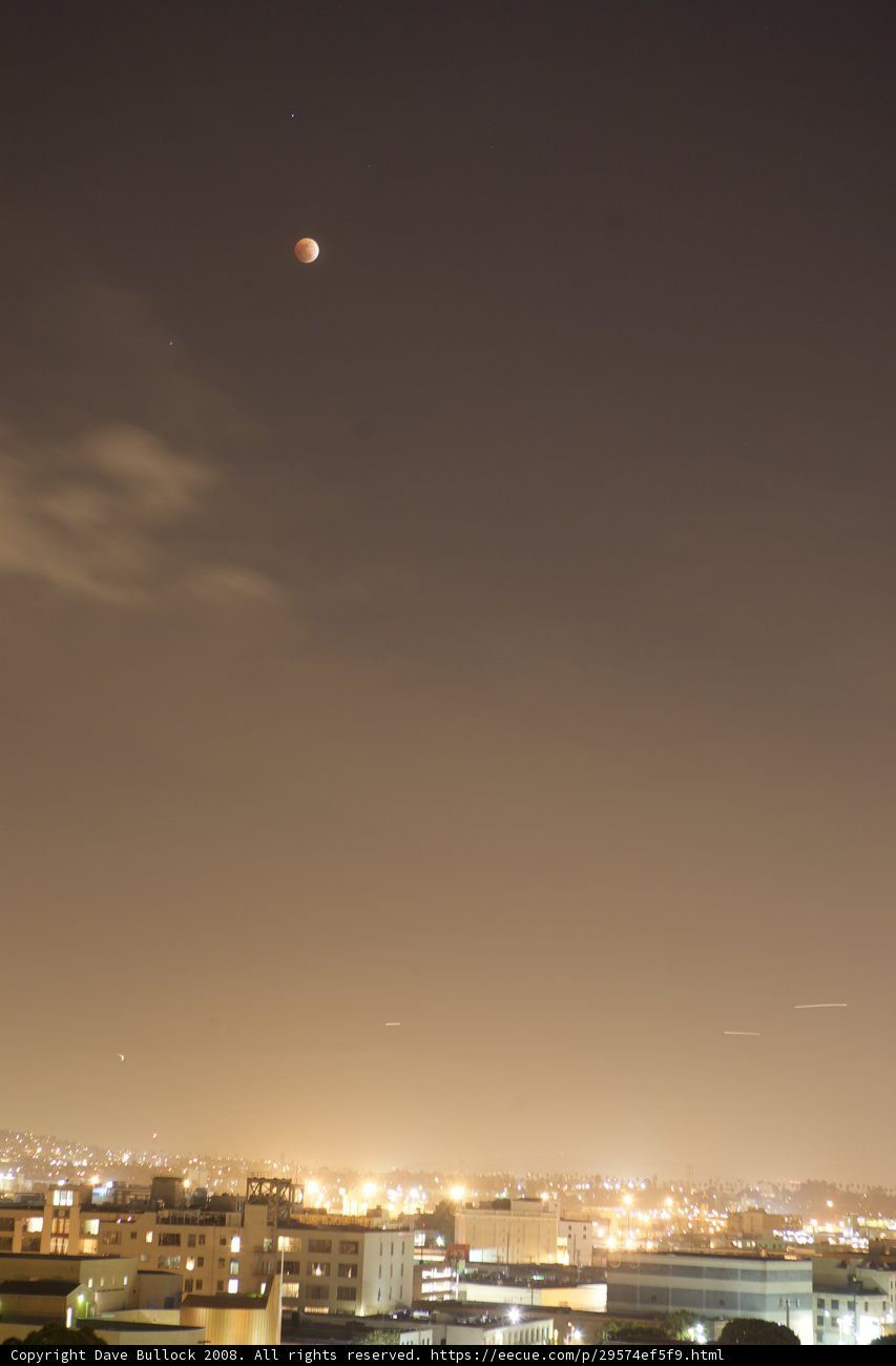 Lunar Eclipse over the Cityscape