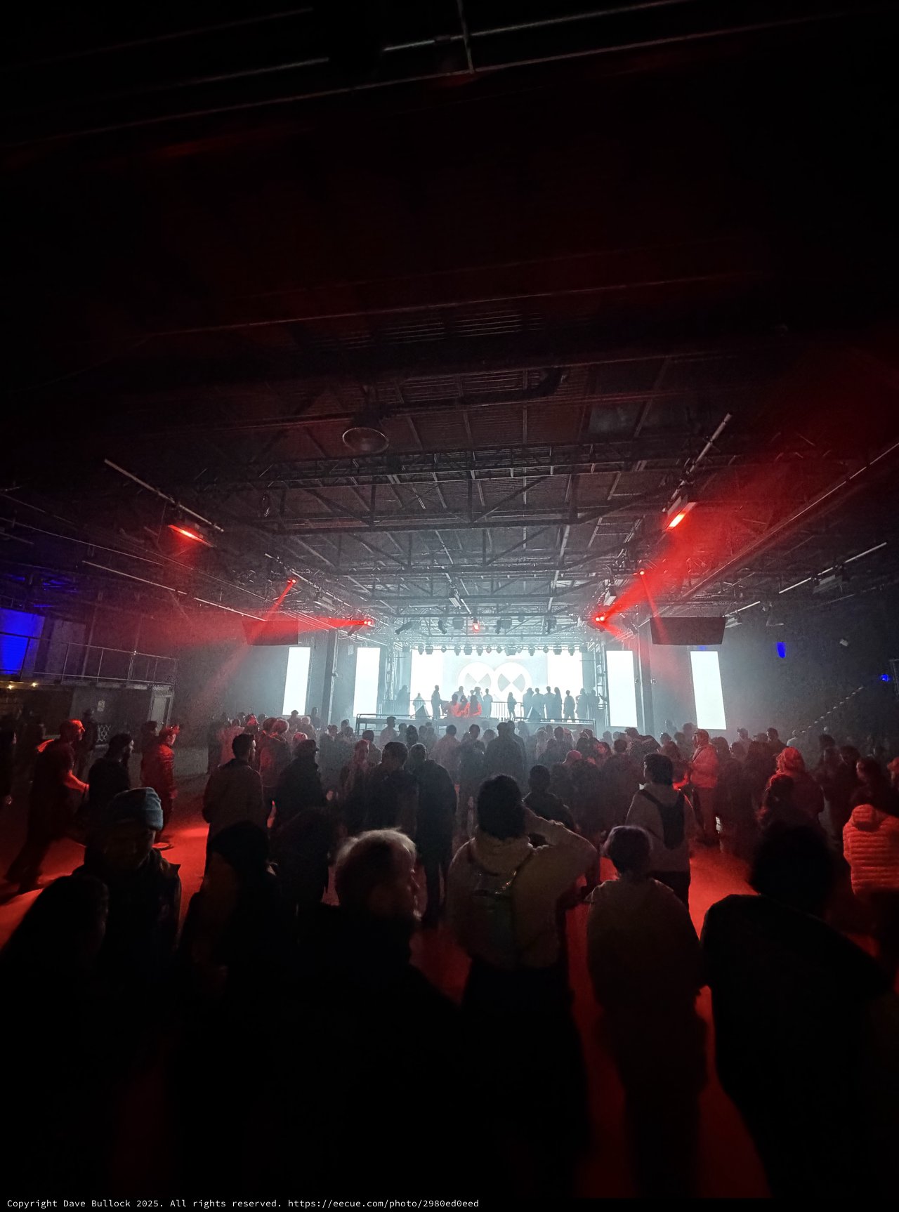 Electronic Music Concert with Red Stage Lighting