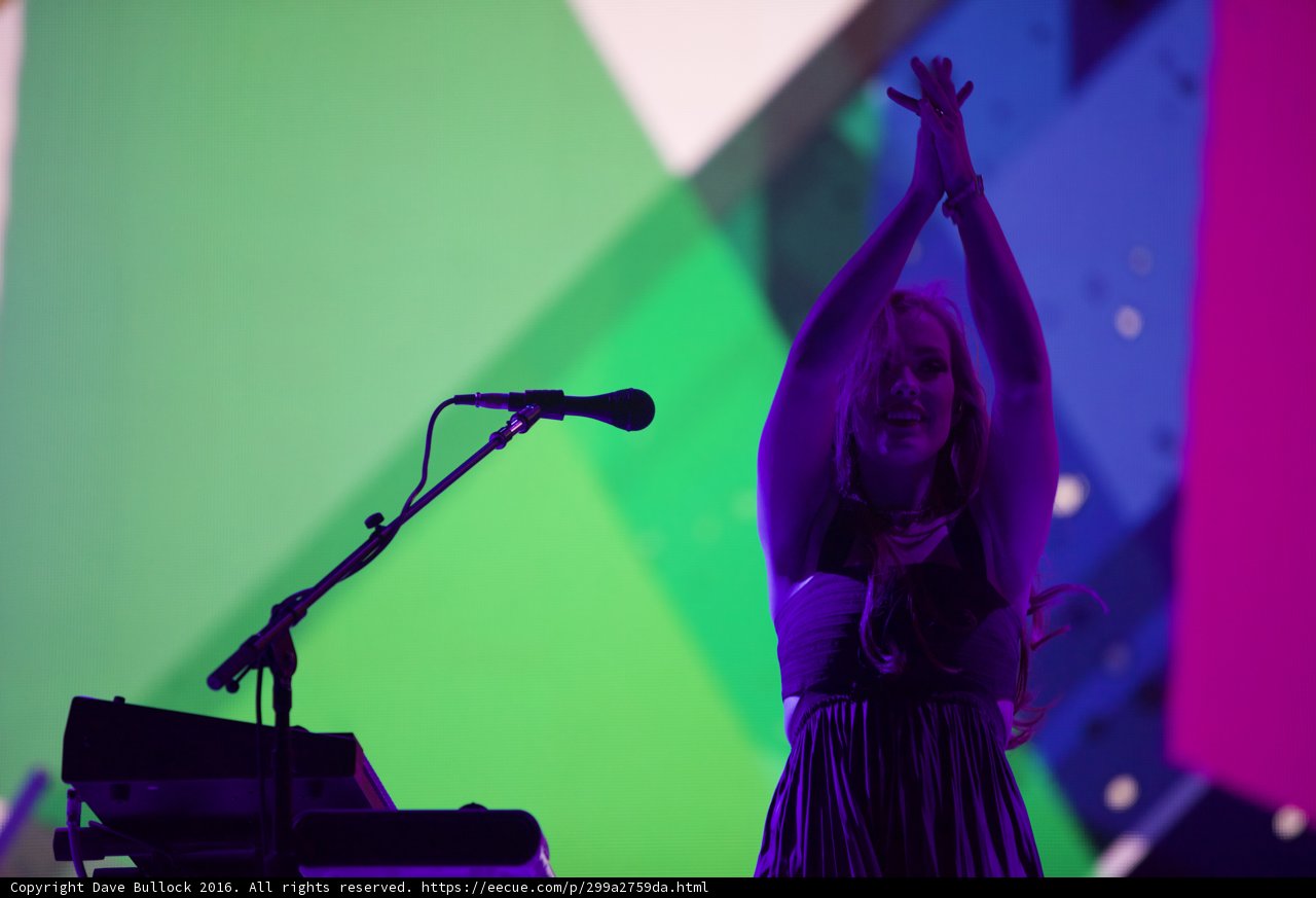 Woman in Red Dress Shines on Coachella Stage