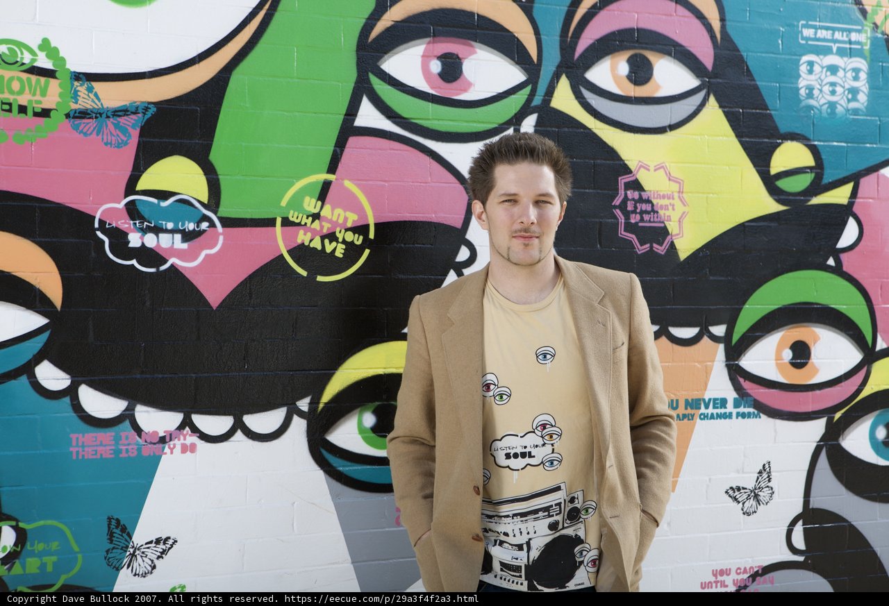 Standing Tall in Front of Graffiti