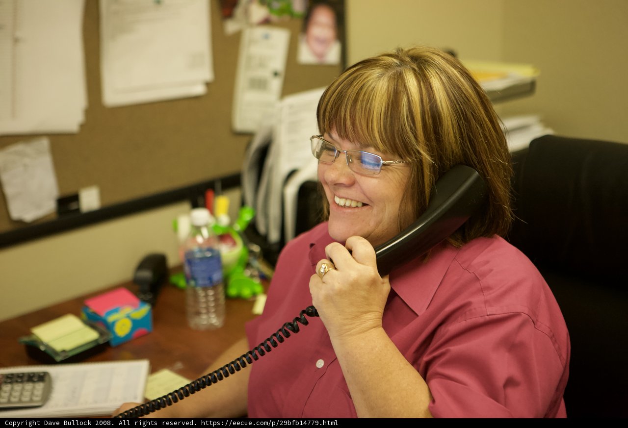 Pink-Clad Woman on a Serious Call