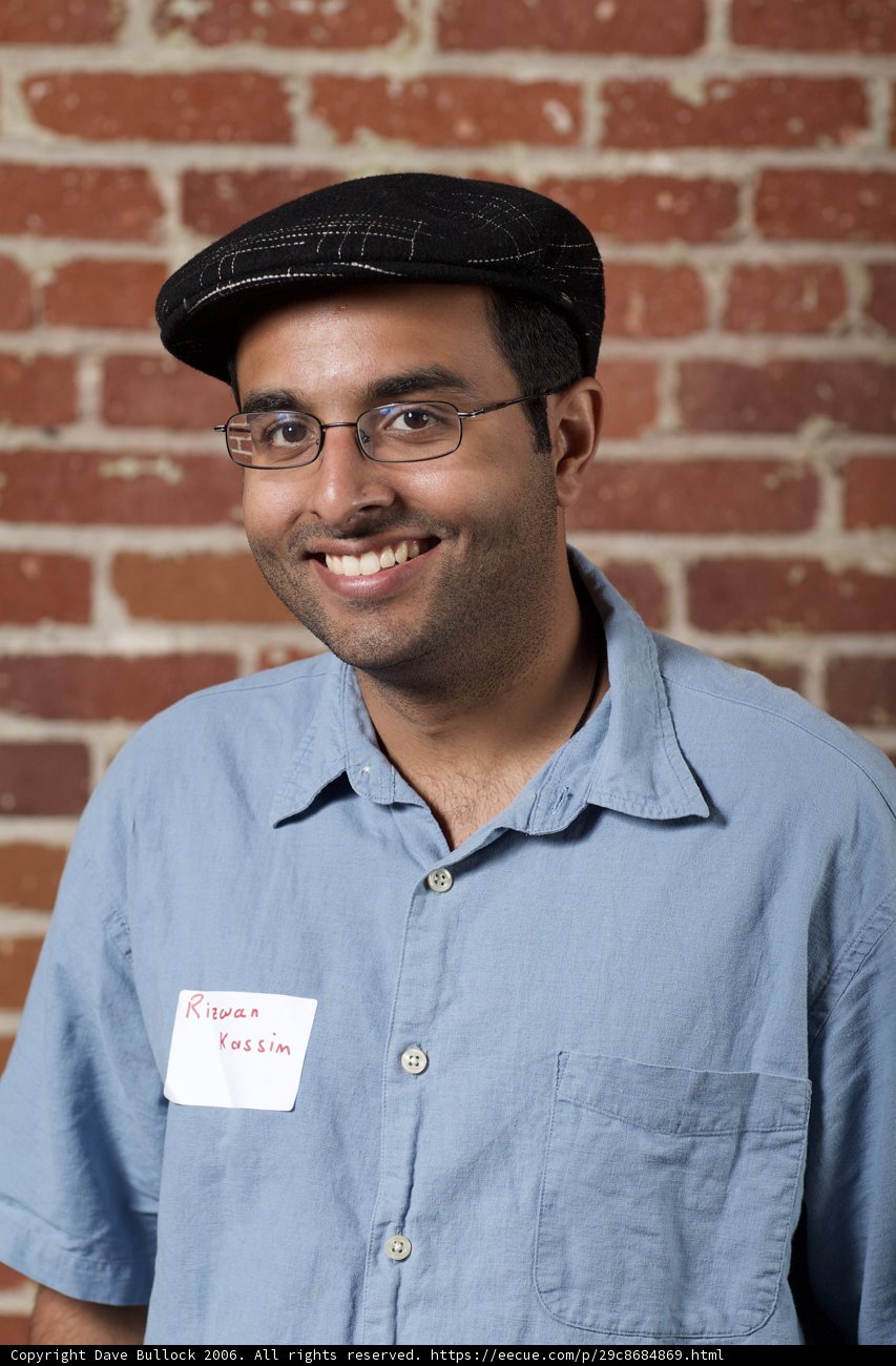Happy man in glasses and hat