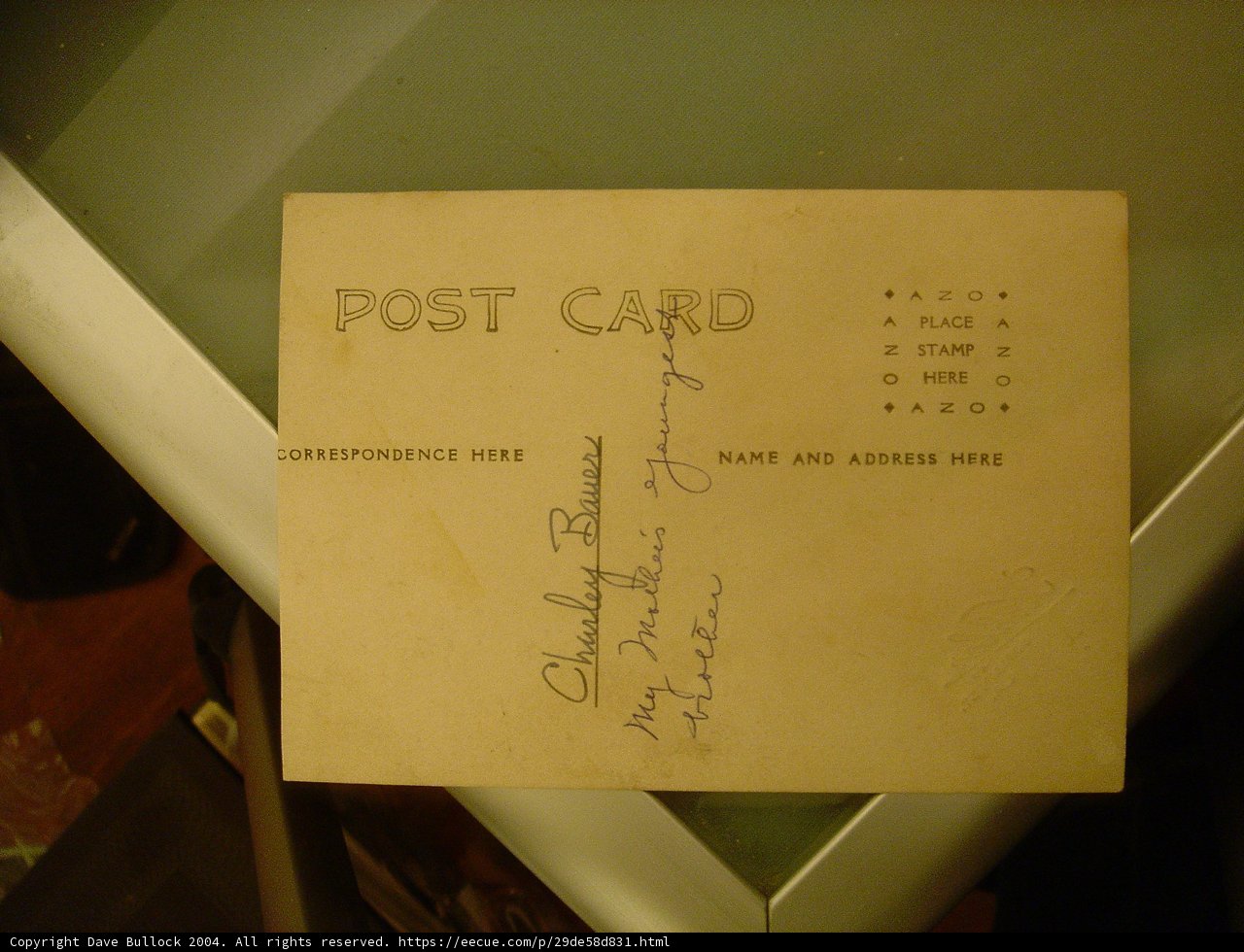 Handwritten Note on Postcard