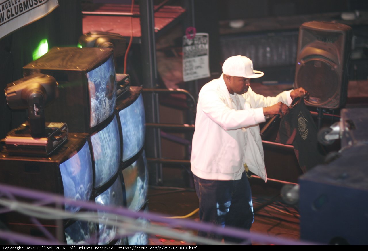 Man in White Jacket Rocks the Stage