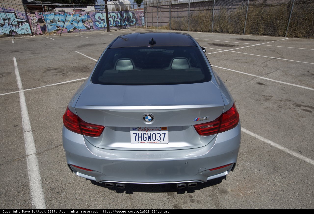 Silver BMW M4 Rear End in Parking Lot