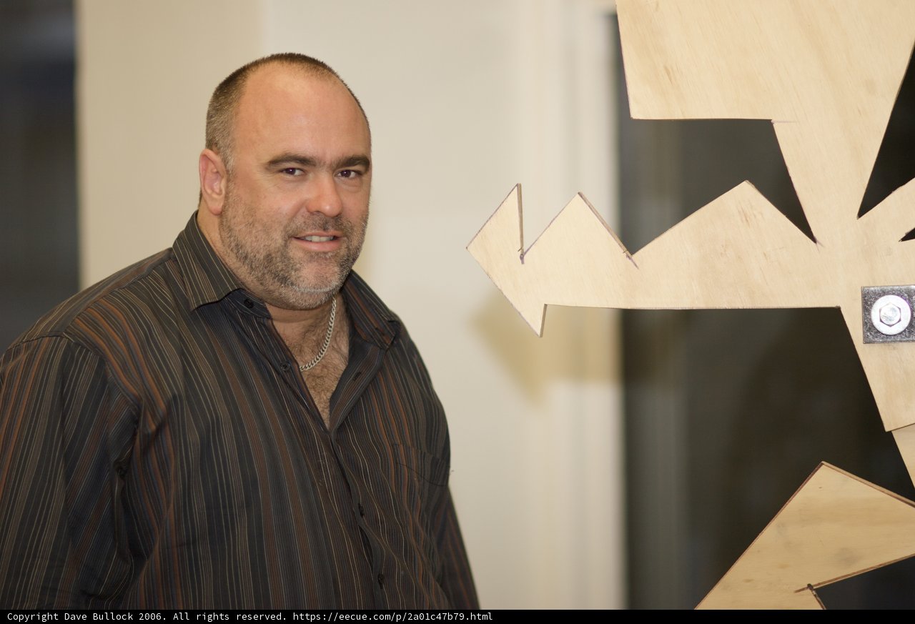 Standing Before Plywood Art