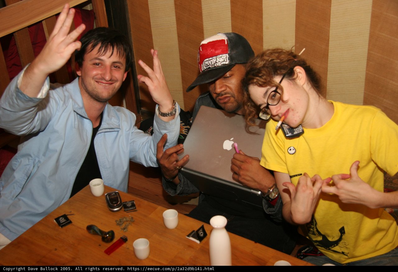 Three Friends Catching Up Over Drinks