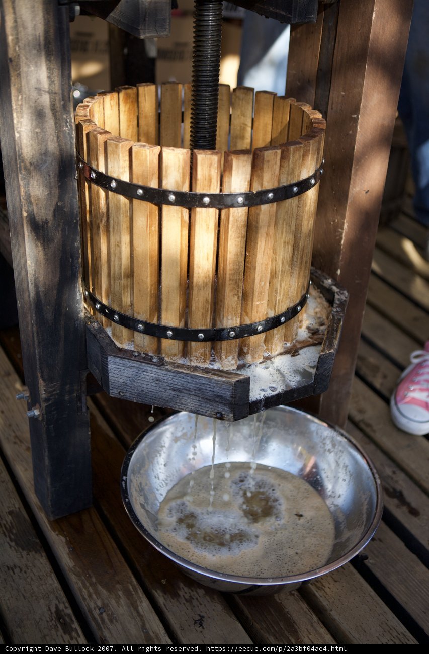 Wooden Barrel and Metal Bucket