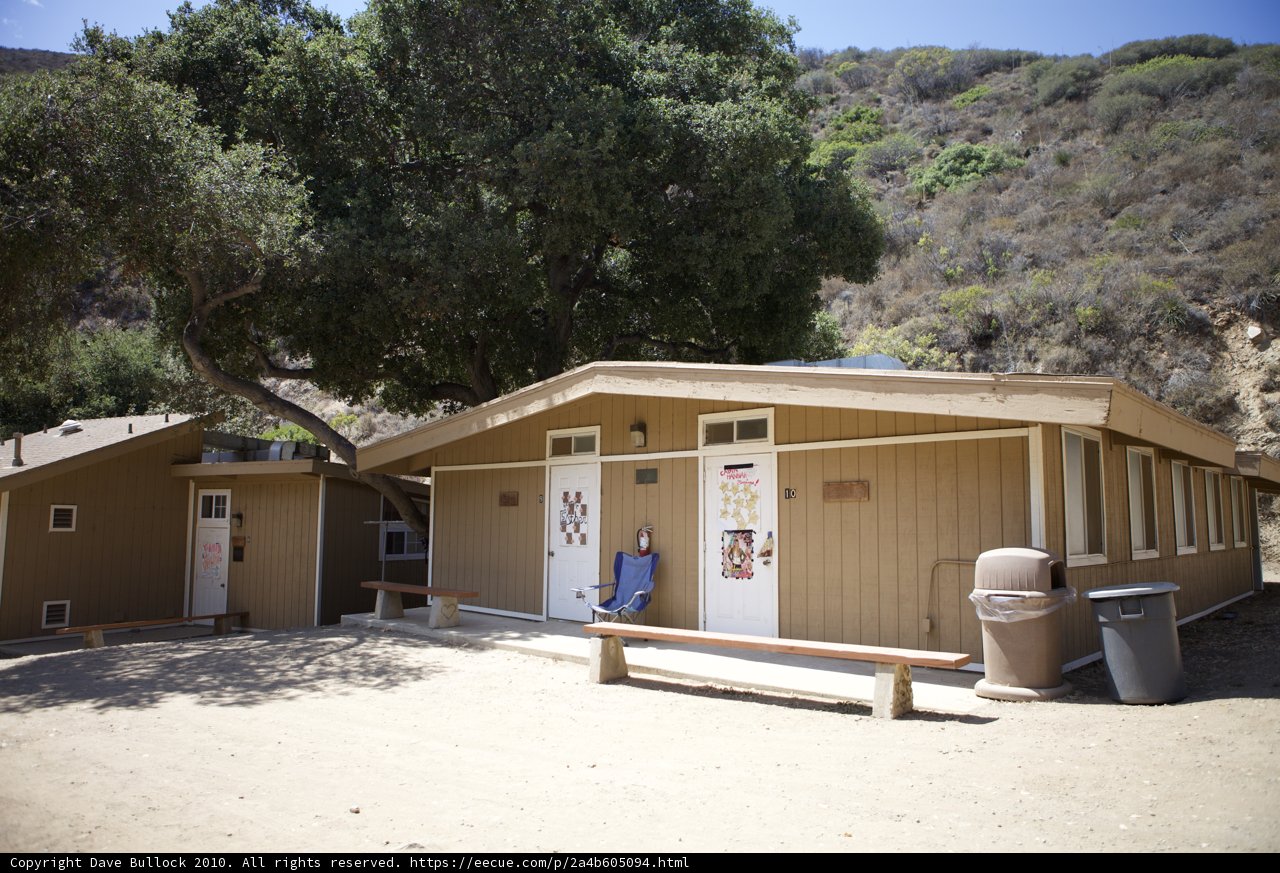 The Plywood Shelter with Two Toilets and a Bench