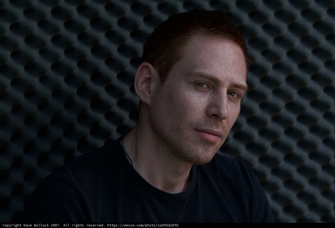 Confident Man in Black Shirt