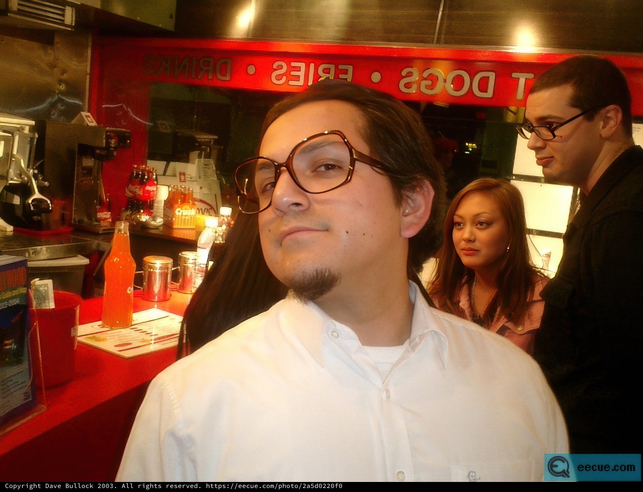 Man in Glasses Enjoys a Night Out at the Pub